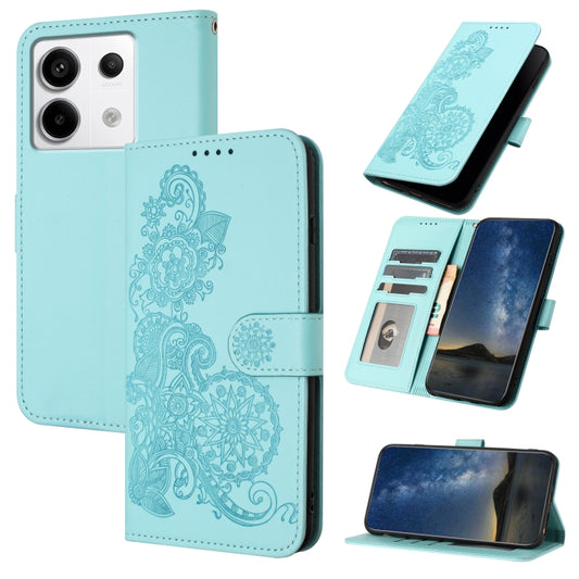 For Xiaomi Redmi Note 13 Pro 4G Datura Flower Embossed Flip Leather Phone Case(Light blue) - Note 13 Pro Cases by buy2fix | Online Shopping UK | buy2fix